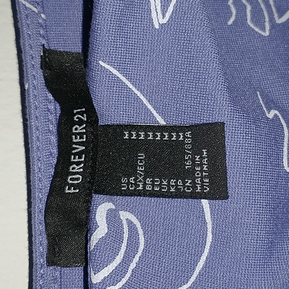 Abstract Face Print Bodysuit_Asymetrical Neck - Picture 10 of 11